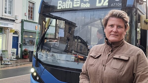 Sarah Dyke in front of the D2 bus in Frome